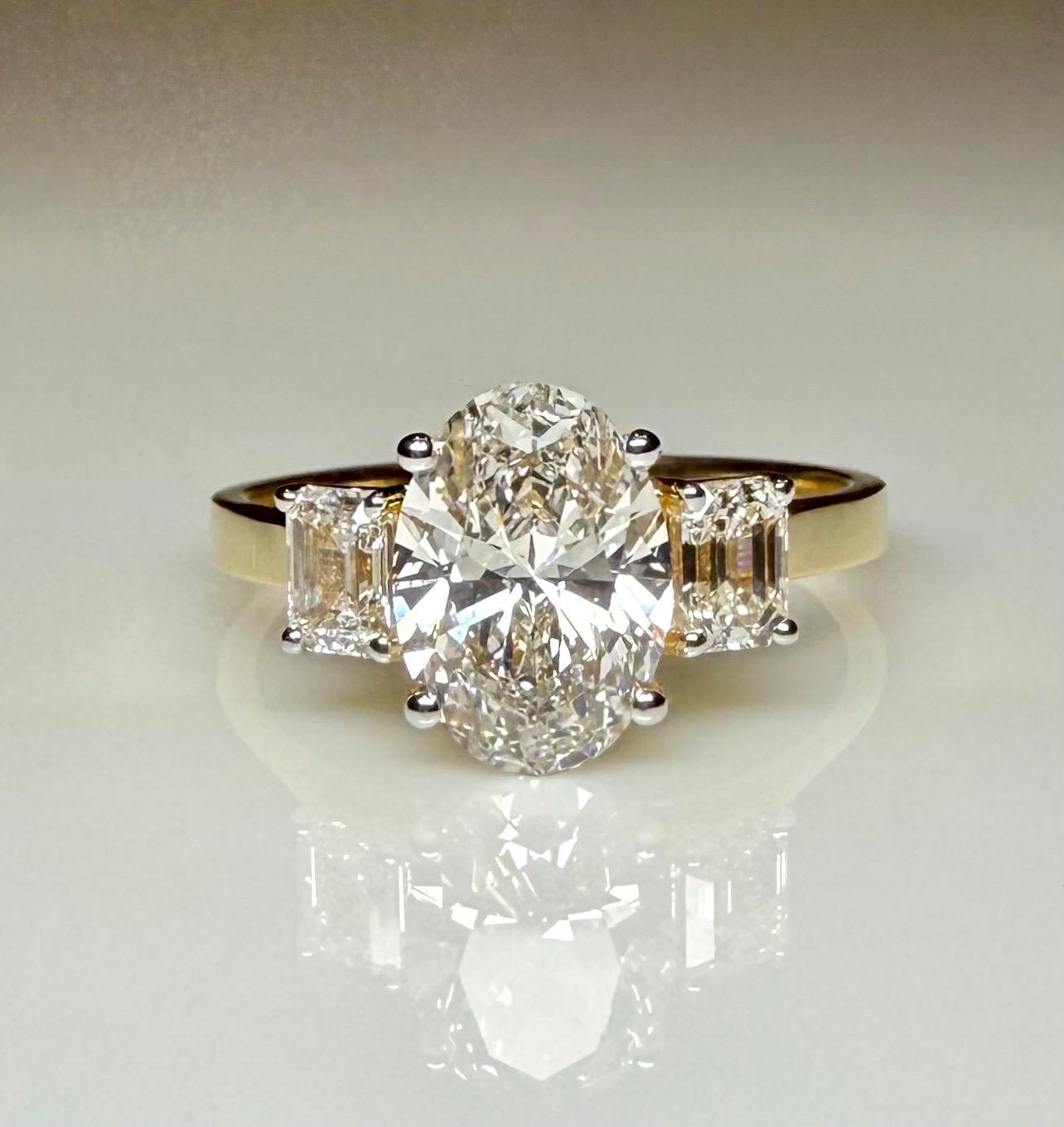 Oval Lab Grown Diamond Engagement Ring: 14K Gold Three Stone Emerald Accents