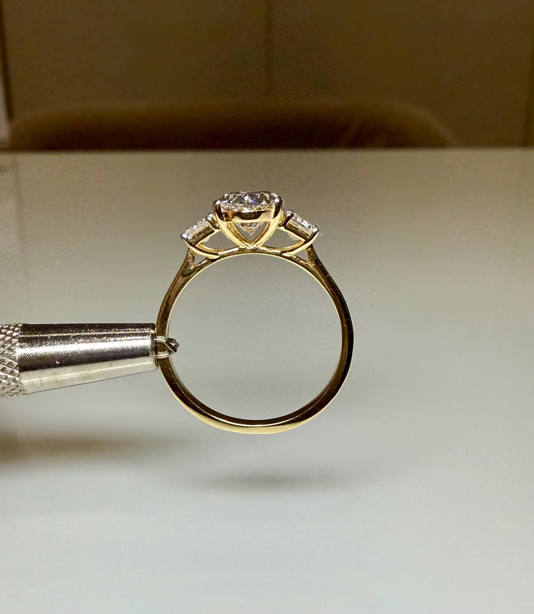 Oval Lab Grown Diamond Engagement Ring: 14K Gold Three Stone Emerald Accents