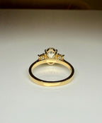 Oval Lab Grown Diamond Engagement Ring: 14K Gold Three Stone Emerald Accents