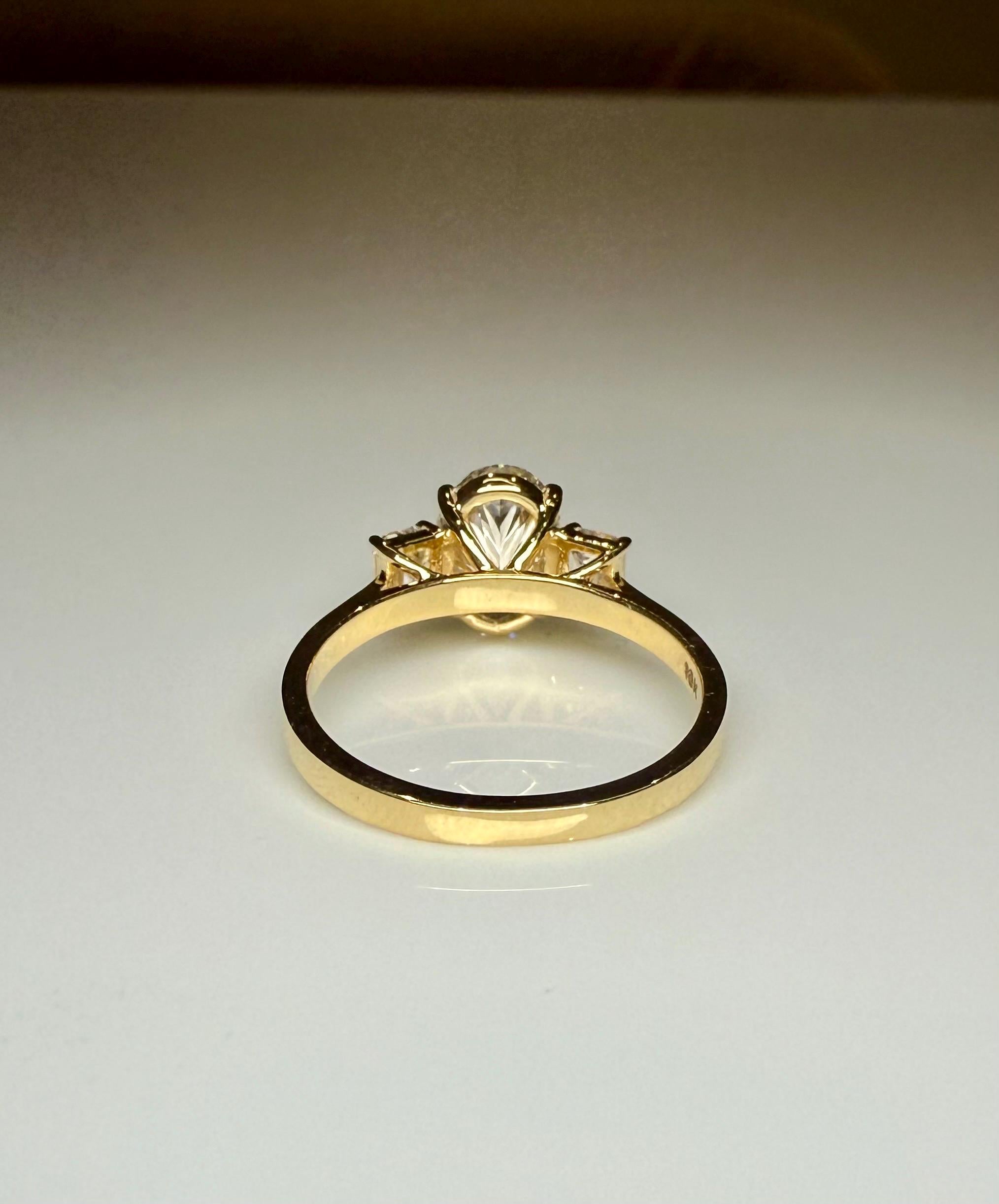 Oval Lab Grown Diamond Engagement Ring: 14K Gold Three Stone Emerald Accents