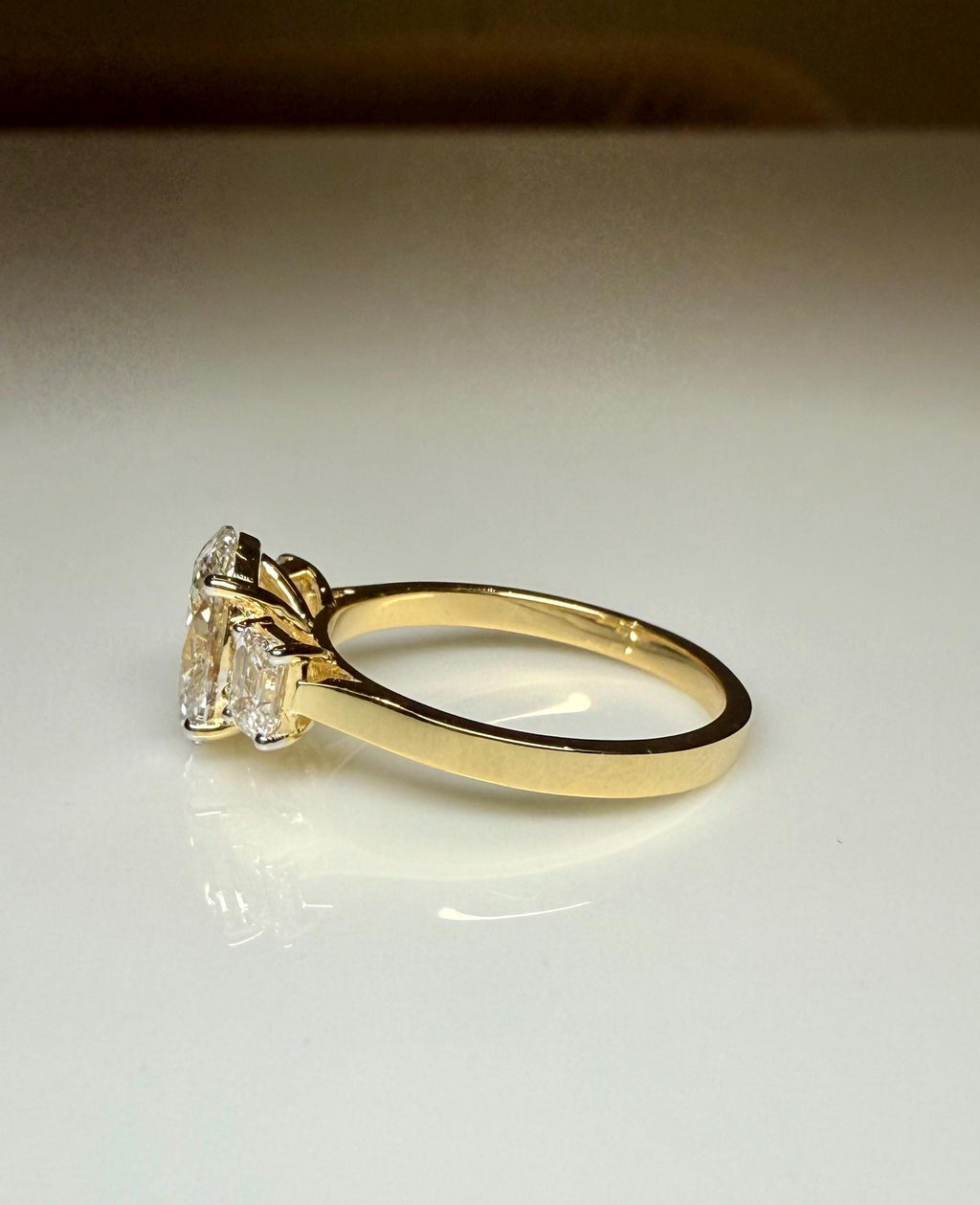 Oval Lab Grown Diamond Engagement Ring: 14K Gold Three Stone Emerald Accents